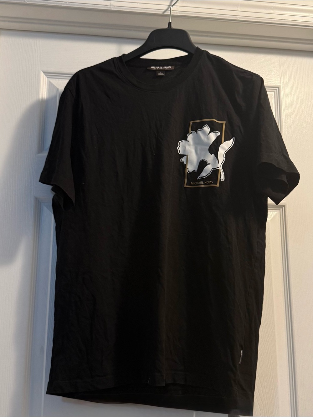 Michael Kors Black Tee with White Floral Patch and Gold Trim